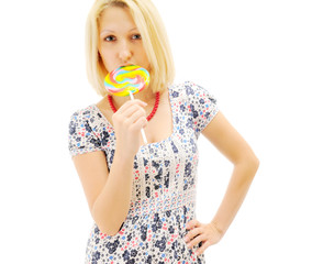Attractive blonde eating lollipop
