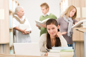 High school library - Student with laptop