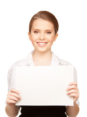 Fototapeta premium happy teenage girl with blank board