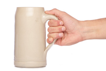Hand holding german Beer Stein Mug