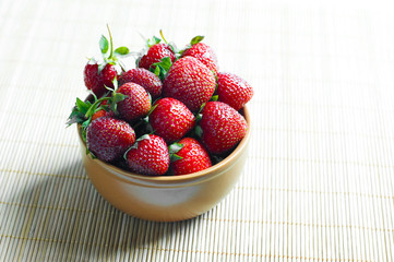 ripe strawberries in Ceramic bowl