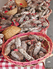 Many french sausages in some osier baskets