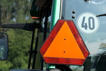 Warning triangle on tractor