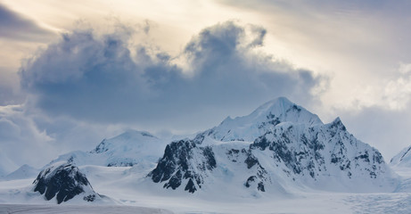 Fototapeta na wymiar Snow-capped mountains