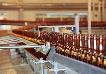 Conveyer line with many beer bottles