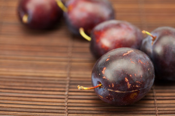 Plum on a bamboo mat