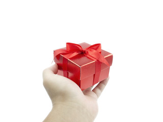 Red gift on human hand