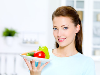 Beautiful woman with vegetables