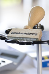 Stempel mit der Aufschrift Sozialversicherung