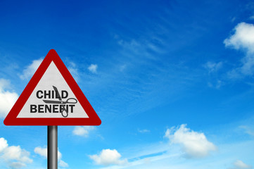 'Child Benefit Cuts' represented by a photo-realistic 'warning'