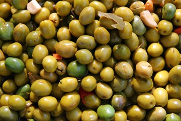 olives in pickling brine background texture