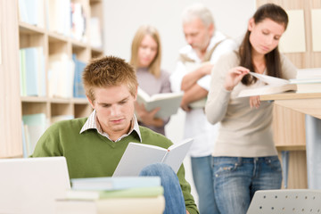 Fototapeta premium High school library - Student with book