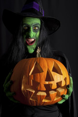 Witch holding pumpkin/Jack O Lantern