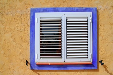 Mediterranean wood window blue frame