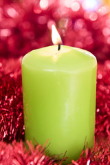 green burning candle