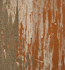 cement and stucco dirt grunge on the side of an orange steel met