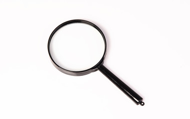Magnifying glass over white background