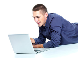 man typing on laptop - isolated white