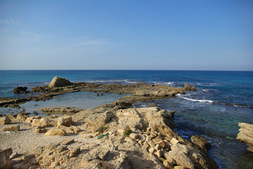 Fototapeta na wymiar Ruins of harbor at Caesarea