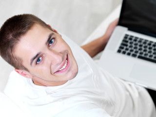 young man using laptop