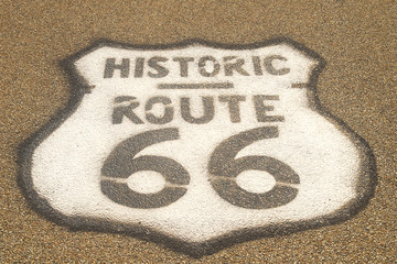 Route 66 sign on pavement
