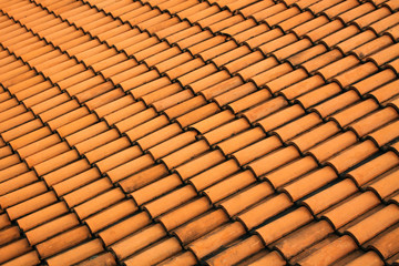 A red tile roof with repeating patterns