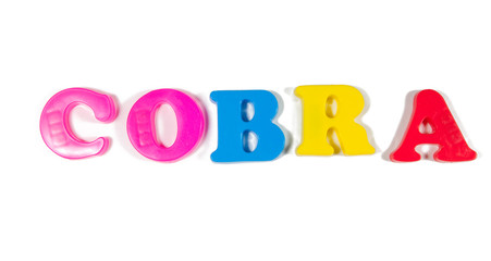 cobra written in fridge magnets