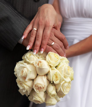 Holding a wedding bouquet