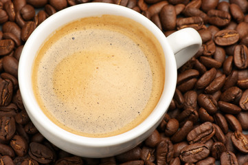 Cup of coffee and coffee beans