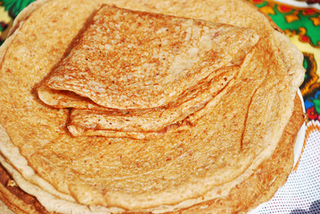 Stack of crepes on a plate