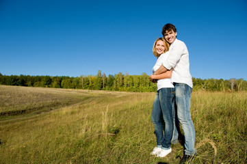 full-length portrait young couple on nature