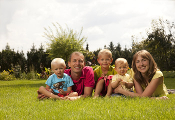 Fototapeta premium Happy family relaxing outdoors