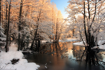 Winter river sunrise light