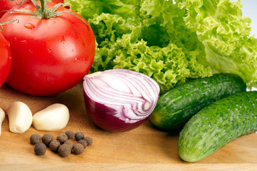 Fresh vegetables on wooden hardboard