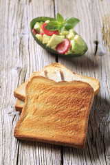 Avocado salad and toasted bread
