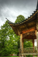 Fototapeta premium Superbly detailed pagoda in lush green gardens