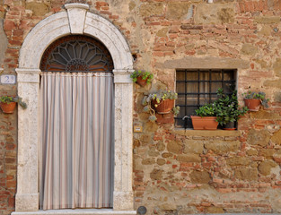 Fototapeta na wymiar Door and Window in Tuscany, Italy