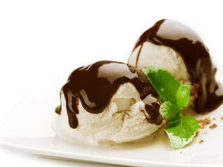 Ice cream with Chocolate topping.Dessert over white