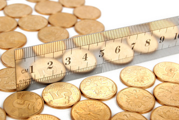 Stainless steel ruler and coins