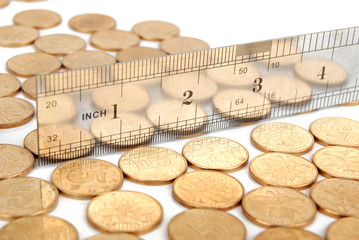 Stainless steel ruler and coins