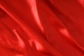 Bright satin fabric folded to be used as background