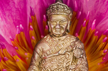 Buddha statue with lotus flower