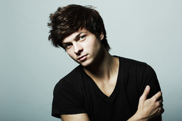 Fashion portrait of the young beautiful man © Oleg Gekman