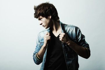 Fashion portrait of the young beautiful man