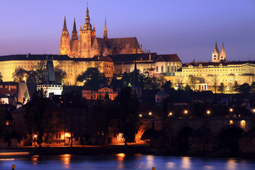 Colorful Prague gothic Castle with Charles Bridge in the Night