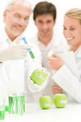 Genetic engeneering - scientists in laboratory