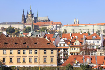 Naklejka na ściany i meble View on the autumn Prague gothic Castle above River Vltava