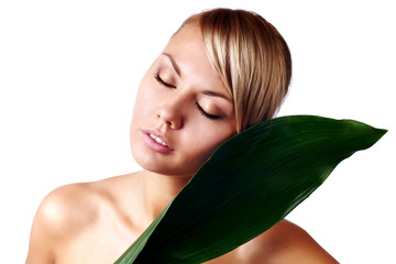 Naklejka premium Close-up face of serene young beautiful woman - beauty treatment