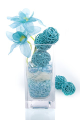 a vase with decoration and flowers