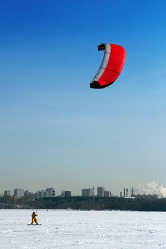 Winter kite surfing on ice